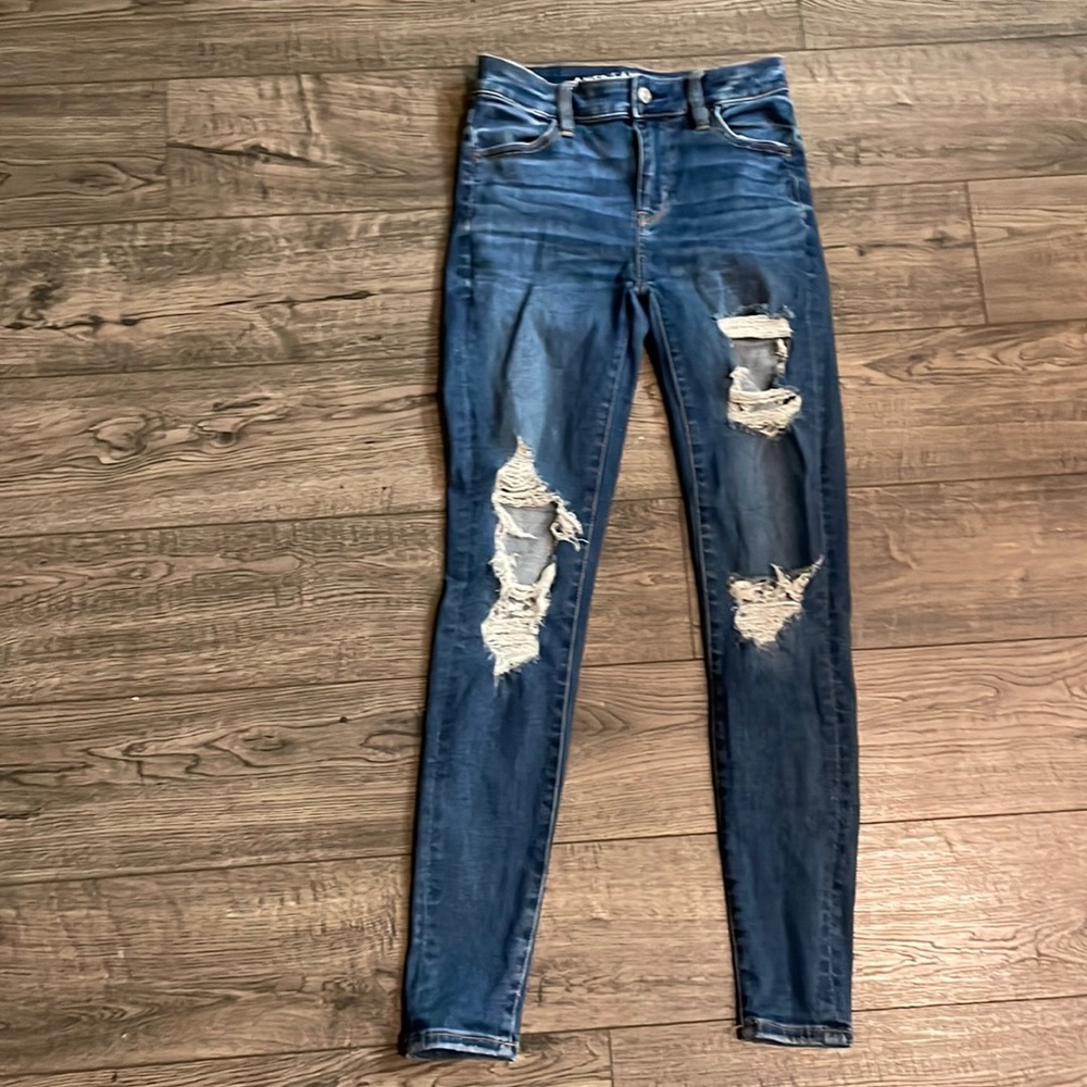 AMERICAN EAGLE DARK WASH SKINNY SIZE 0 (NEXT LEVEL STRETCH)